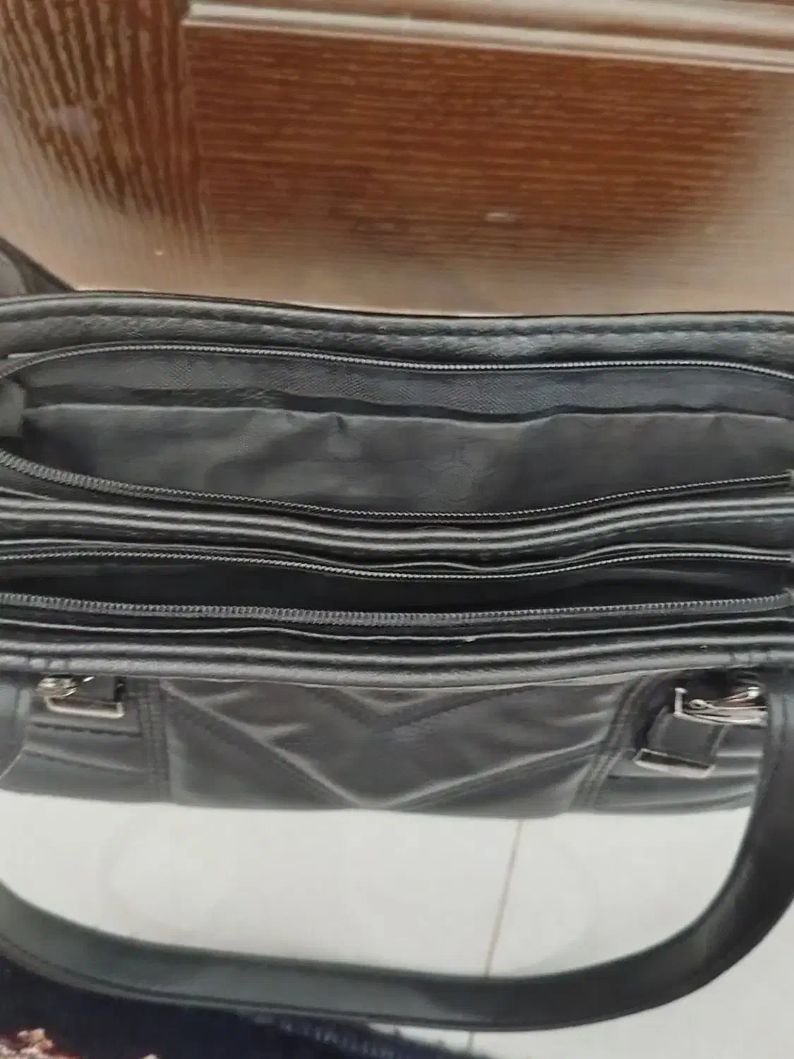 کیف|کیف، کفش، کمربند|نهاوند, |دیوار