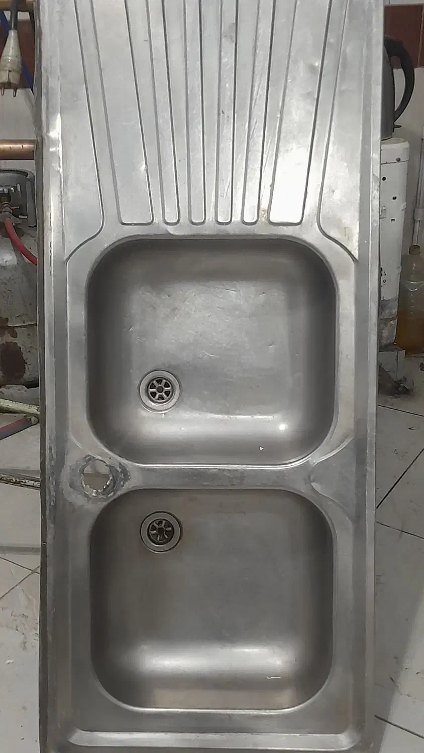 سینگ دوقلو|آب‌چکان و نظم‌دهنده ظروف|تربت‌حیدریه, بوستان باغ ملی|دیوار