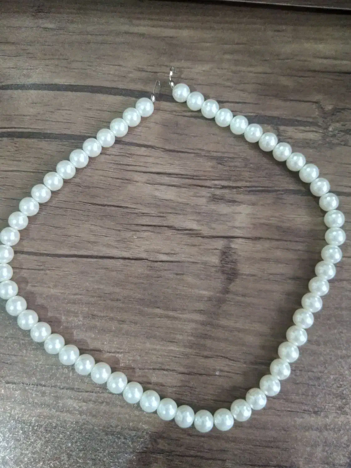 گردنبندمروارید|بدلیجات|رشت, دروازه لاکان|دیوار