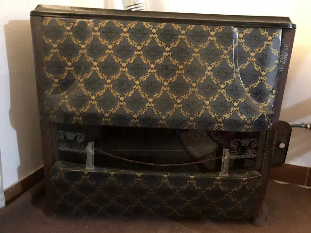 بخاری کاملاً سالم در سنگر|بخاری، هیتر، شومینه|رشت, کوی قدس|دیوار