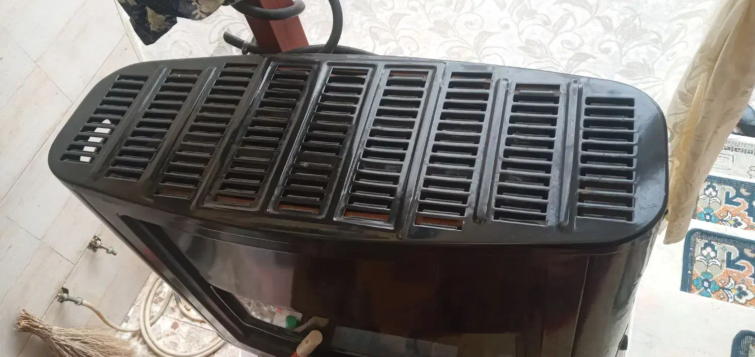 بخاری جهان افروز ۱۵۰۰۰|بخاری، هیتر، شومینه|رشت, ولکس|دیوار