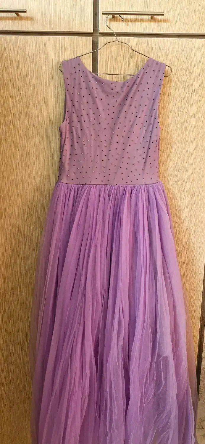 لباس مجلسی|لباس|مشهد, فتح المبین|دیوار