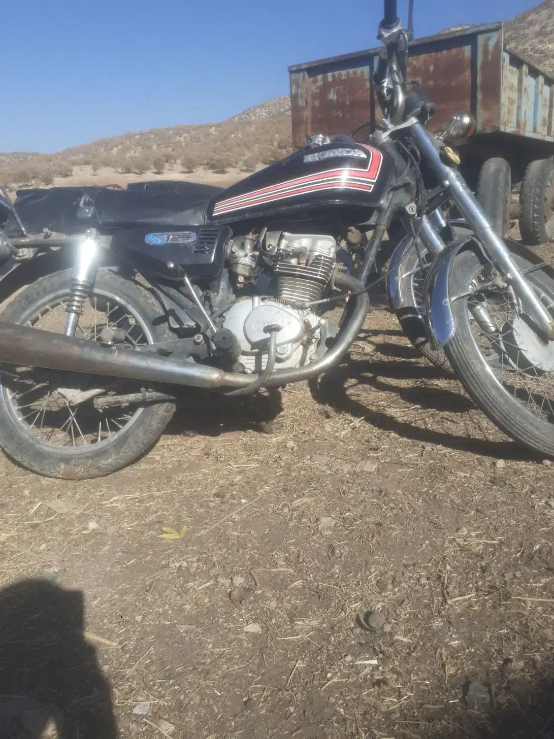 موتور ۱۲۵ چراغ گرد|موتورسیکلت|گهواره, |دیوار