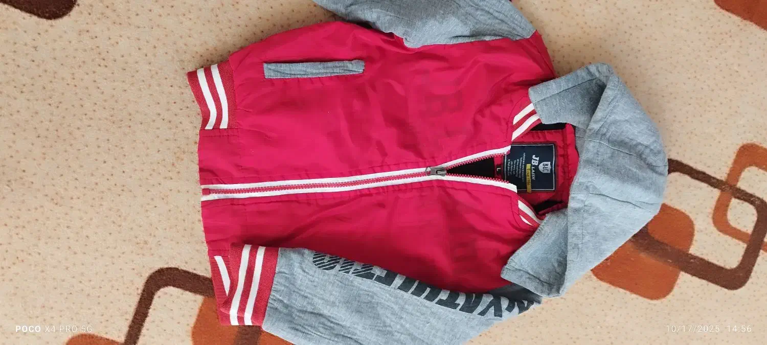 کاپشن|لباس|مشهد, شهید علی محمدی|دیوار