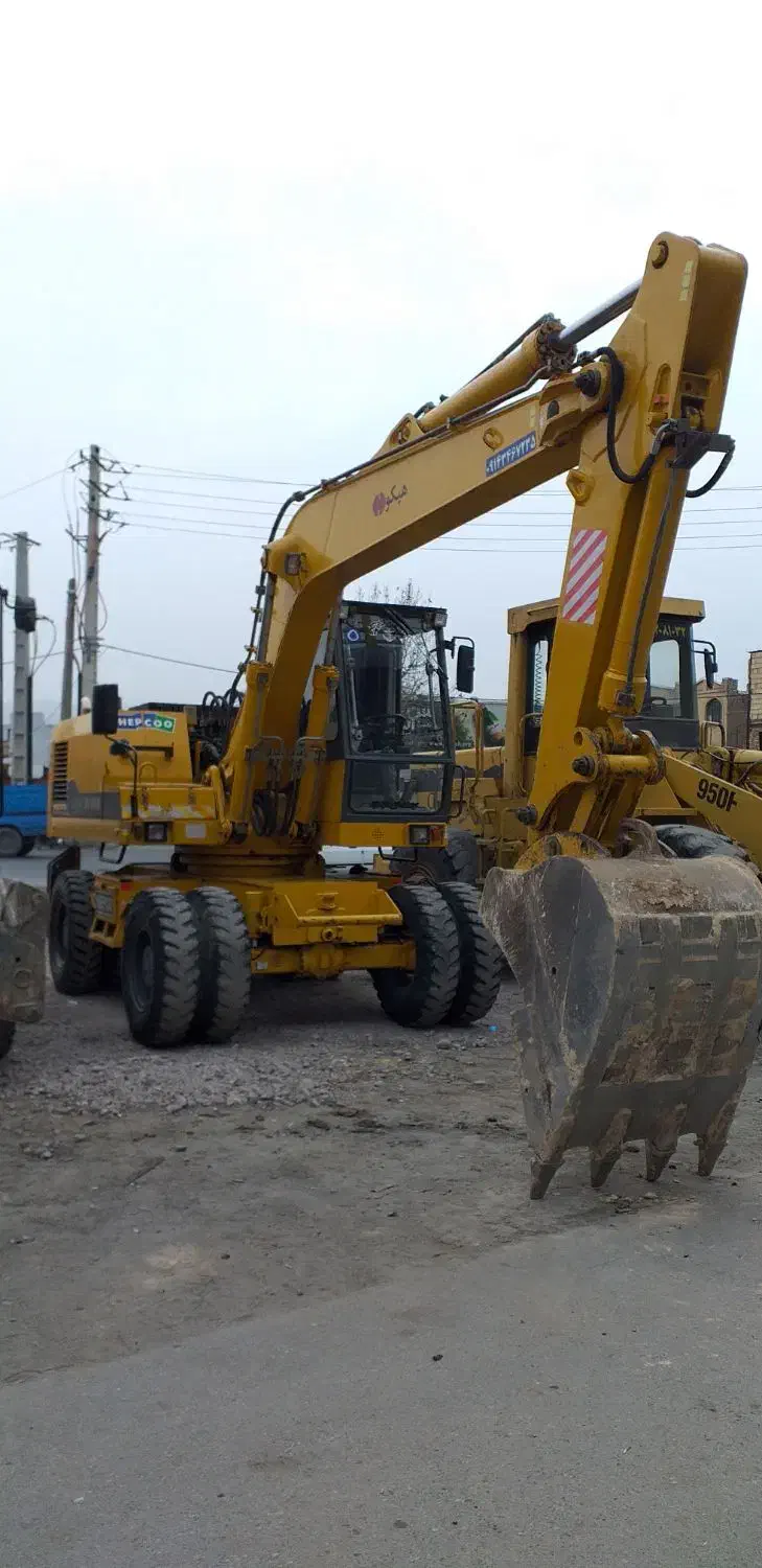 بیل مکانیکی لاستیکی HE 100|خودرو سنگین|تهران, جیحون|دیوار