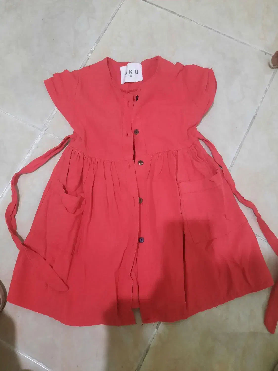 لباس بچه|کفش و لباس بچه|بابل, |دیوار