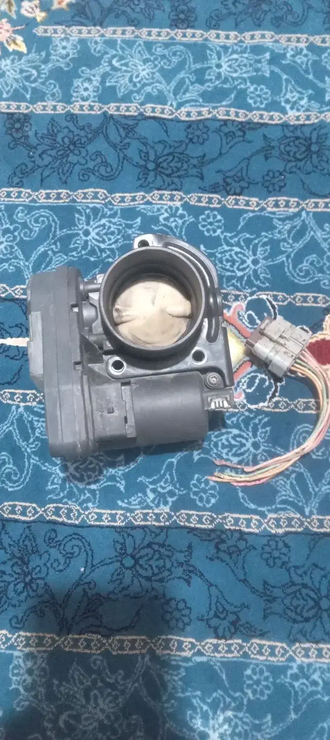 دریچه گاز برقی تیوفایو و اگزوز|قطعات یدکی و لوازم جانبی|سنندج, |دیوار