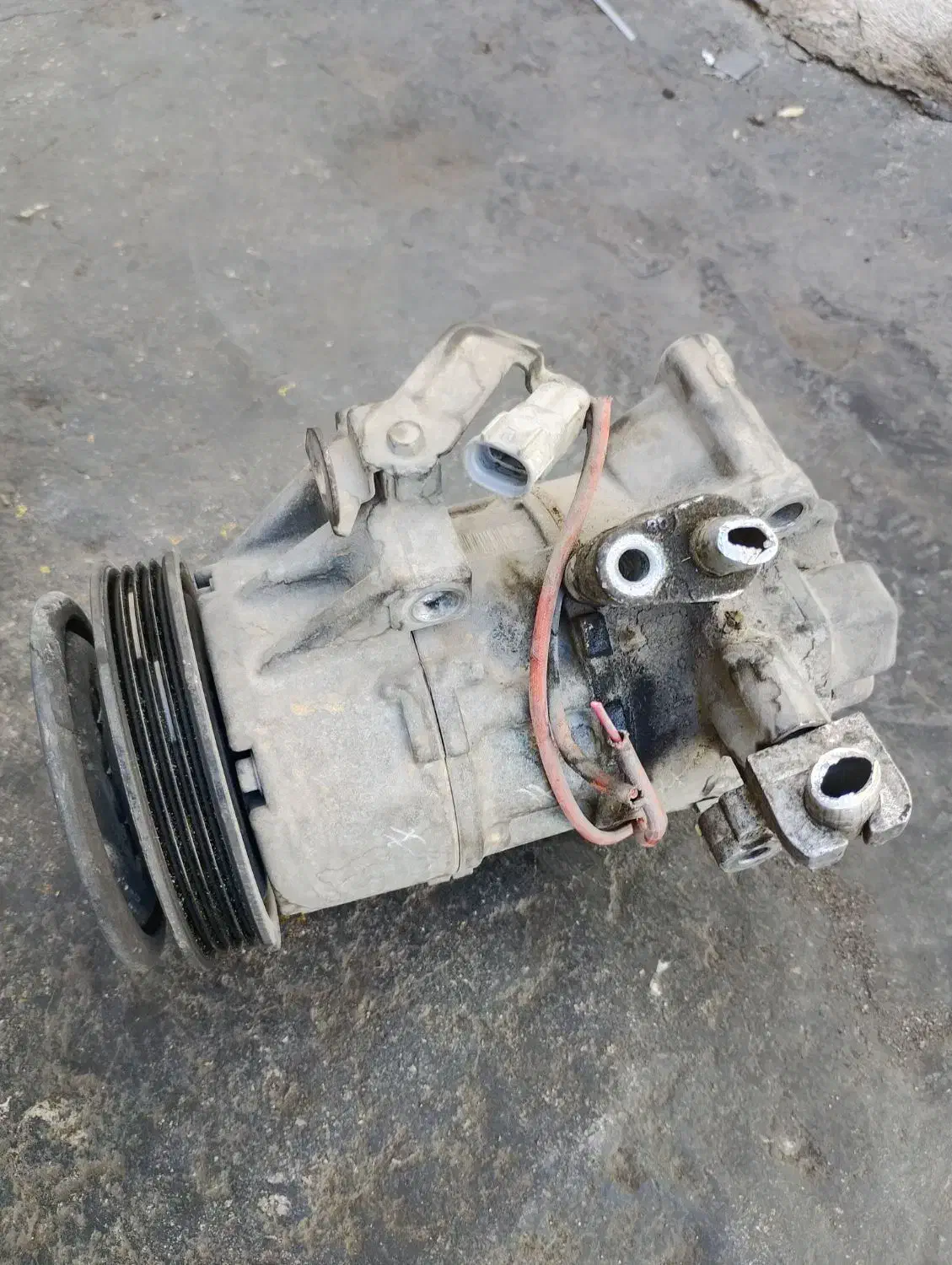 کمپرسور کولر تویوتا یاریس ۲۰۰۸ کارکرده اصلی ژاپن|قطعات یدکی و لوازم جانبی|کیش, |دیوار