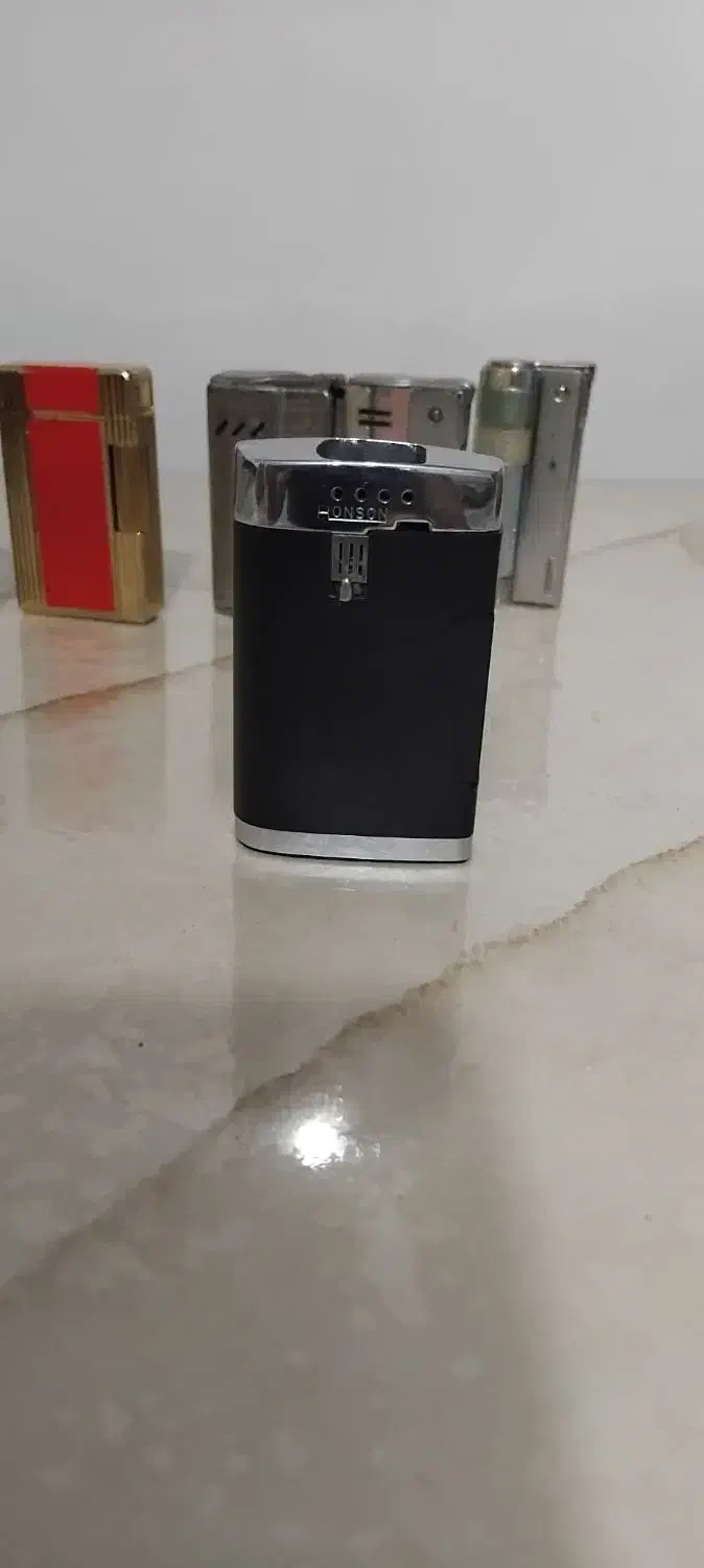 فندک رنسون کومت ساخت انگلستان|کلکسیون اشیاء عتیقه|رشت, توشیبا|دیوار