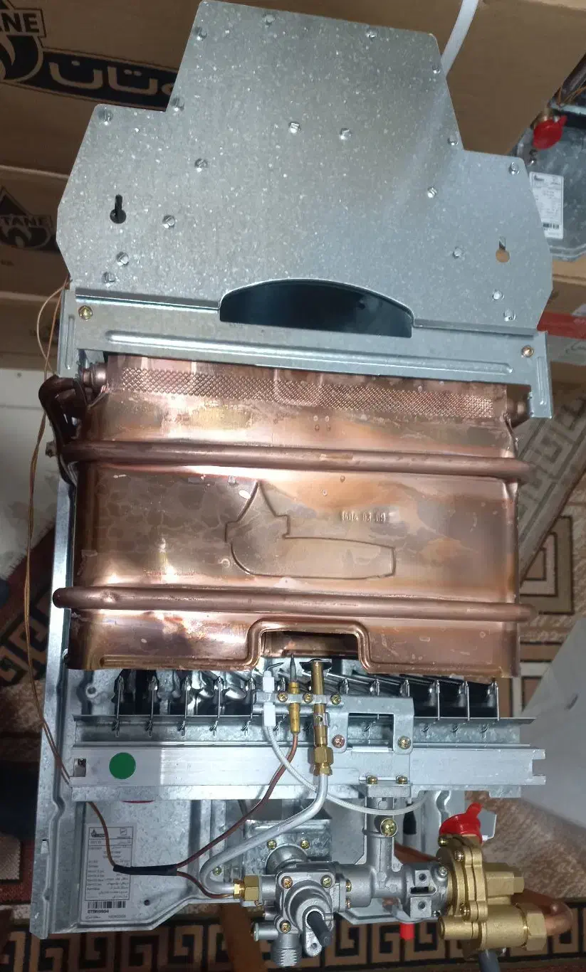 تعمیر تخصصی انواع پکیج .آبگرمکن دیواری و بخاری|خدمات پیشه و مهارت|رشت, گلسار|دیوار