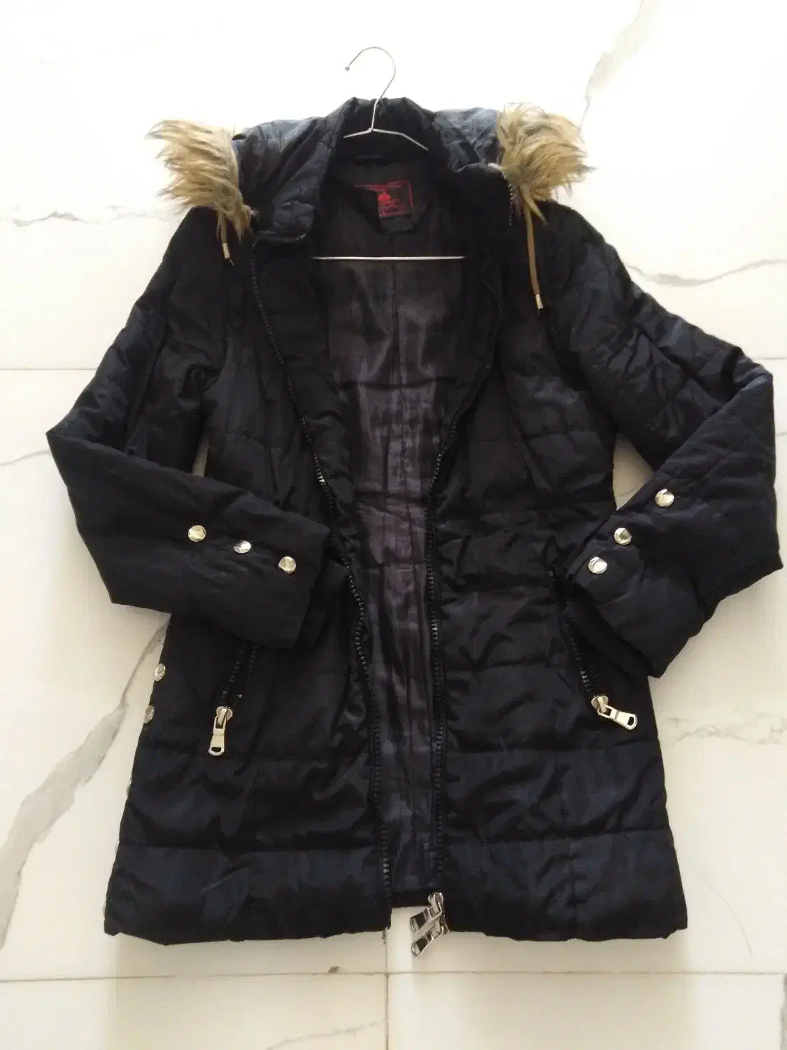 کاپشن|لباس|کرمان, |دیوار