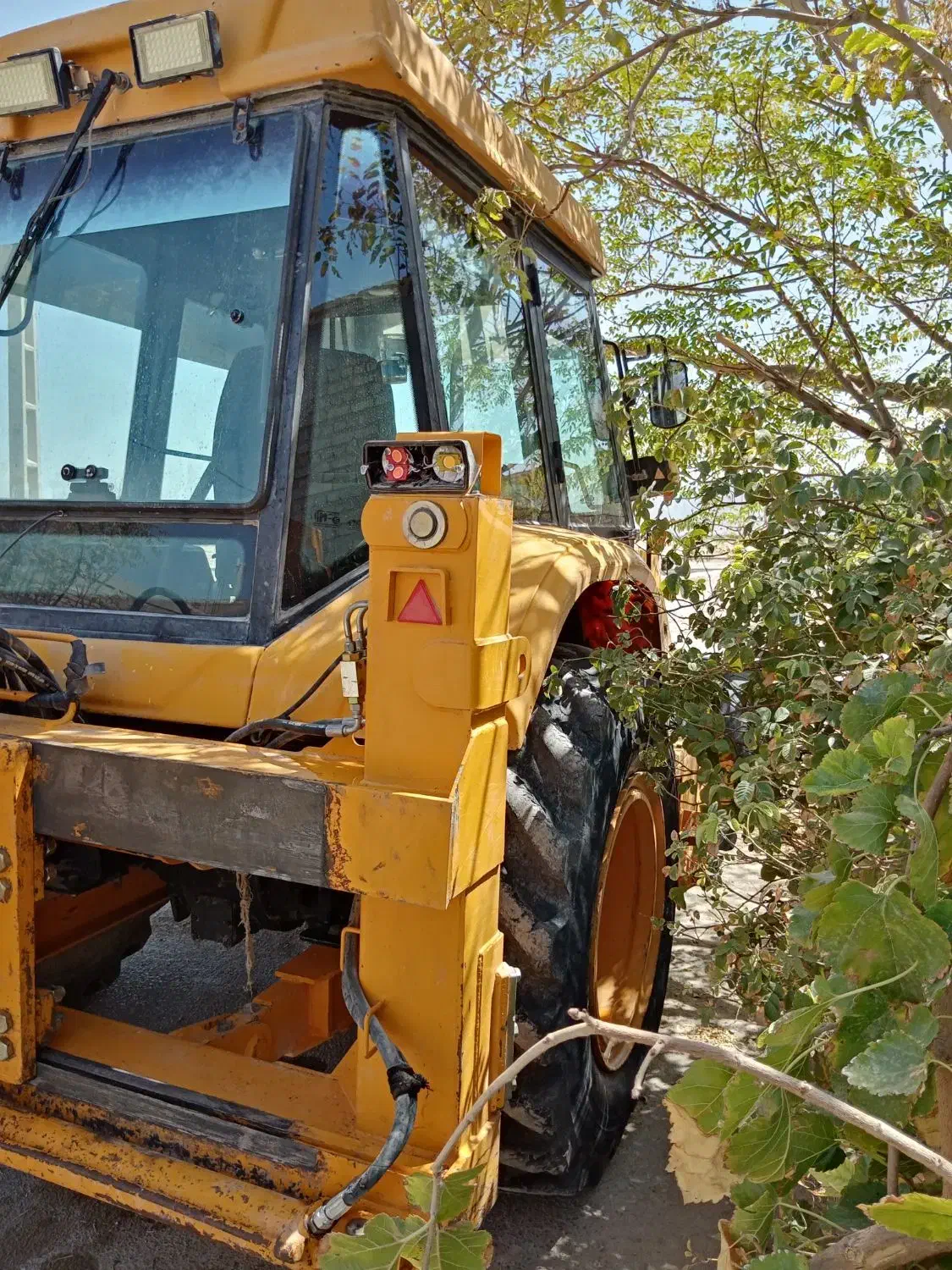 فروش بیل بکهو تی دی ال ۱۰۰ اس|خودرو سنگین|ابرکوه, |دیوار