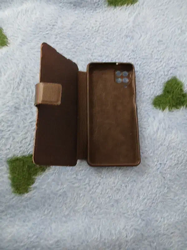 قاب کتابی نو نو کار نکرد مال گوشی a12سامسونگه|لوازم جانبی موبایل و تبلت|خرم‌آباد, |دیوار