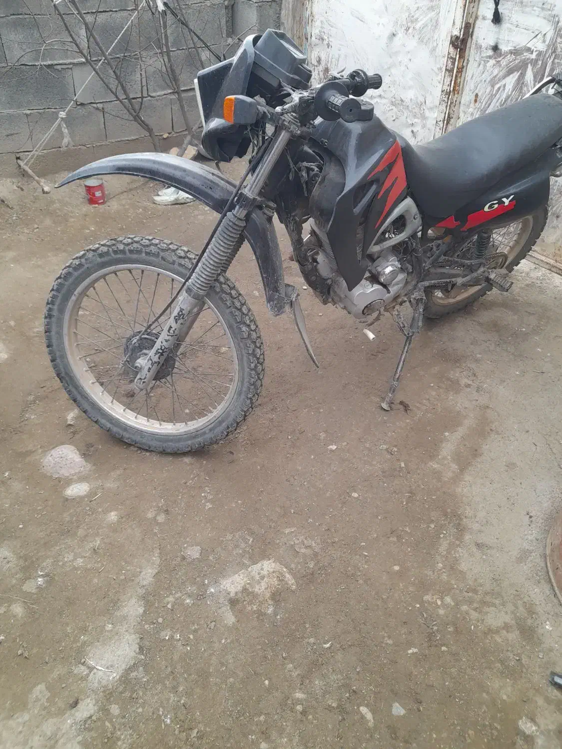 موتورتریل|موتورسیکلت|گهواره, |دیوار