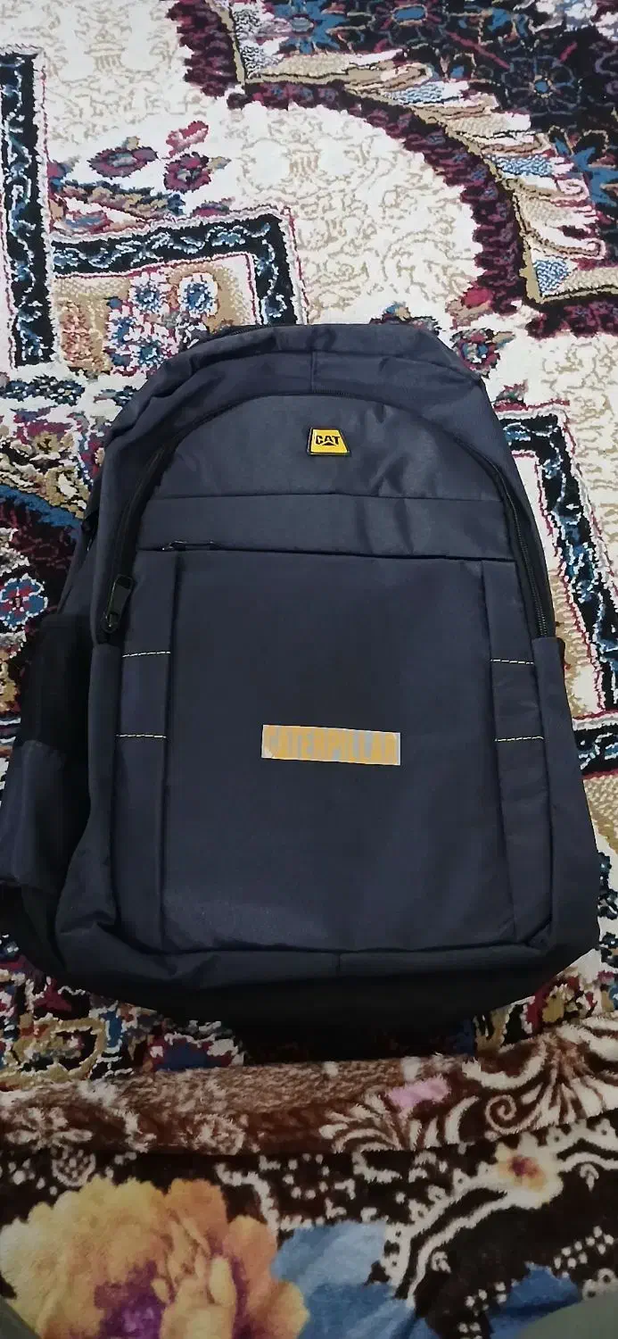 کوله پشتی|کیف، کفش، کمربند|قم, نیروگاه|دیوار