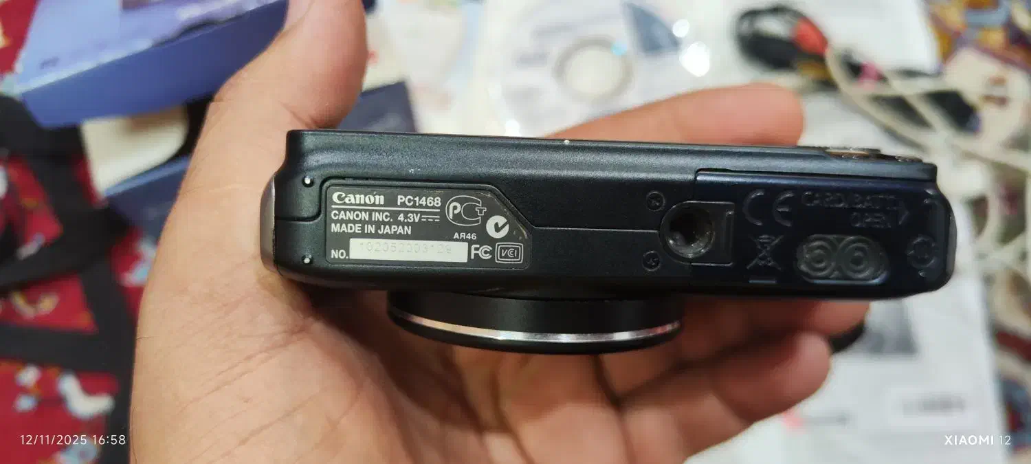 دوربین دیجیتال کنون ۱۴ مگاپیکسلی|دوربین عکاسی و فیلم‌برداری|اندیشه, اندیشه فاز ۴|دیوار