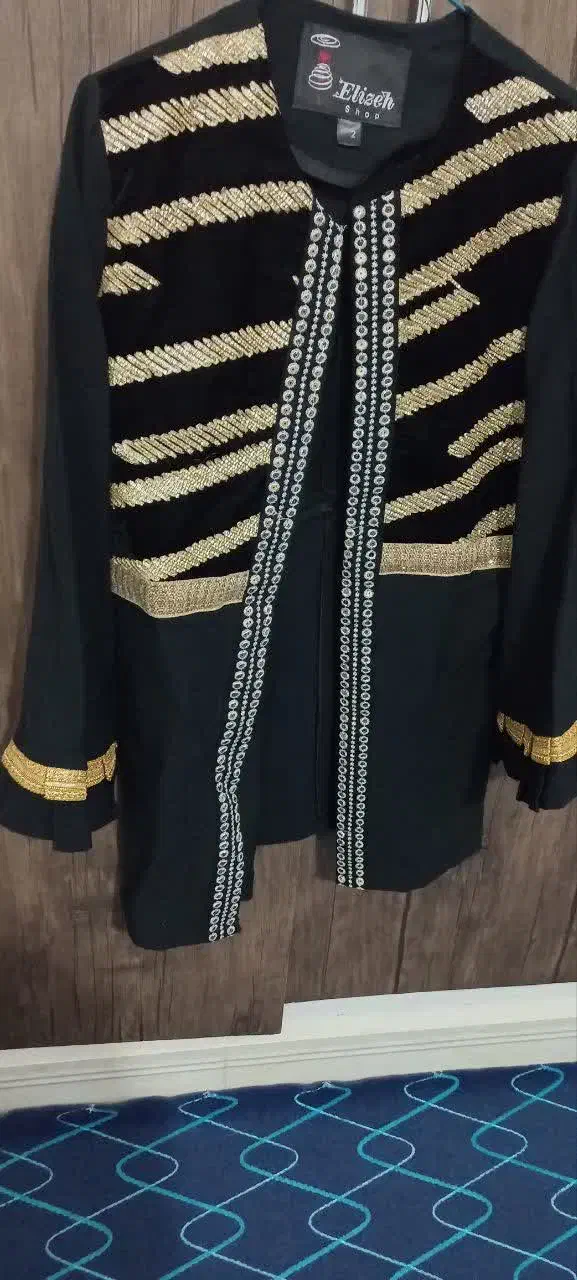 مانتو|لباس|قم, ولیعصر|دیوار