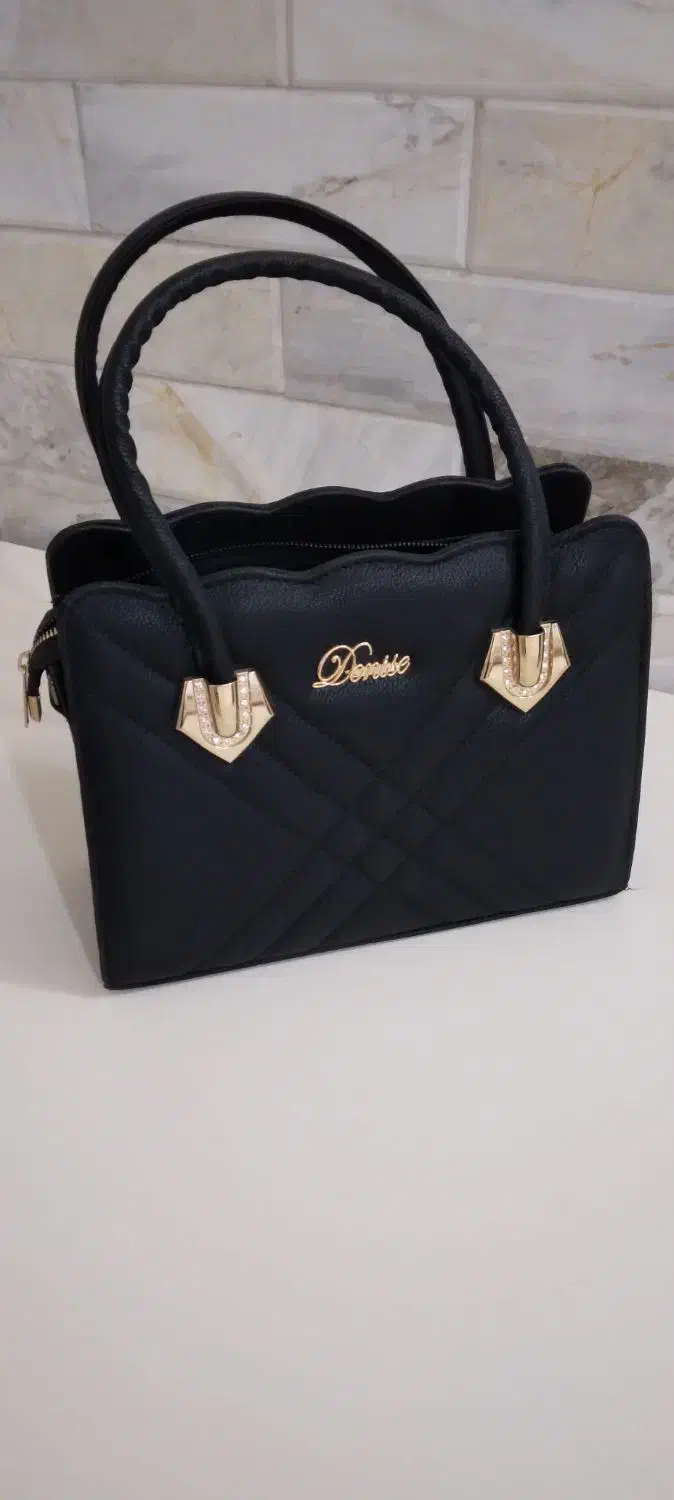 کیف مجلسی|کیف، کفش، کمربند|قم, امامزاده ابراهیم|دیوار