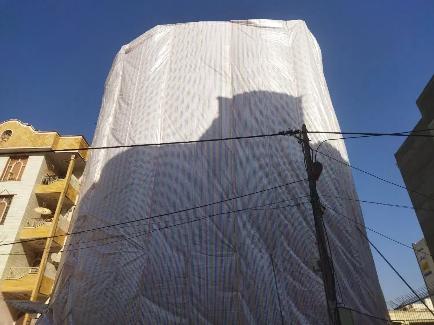 نصب چادر نمای ساختمان،نصب داربست دستمزدی|خدمات پیشه و مهارت|اردبیل, |دیوار