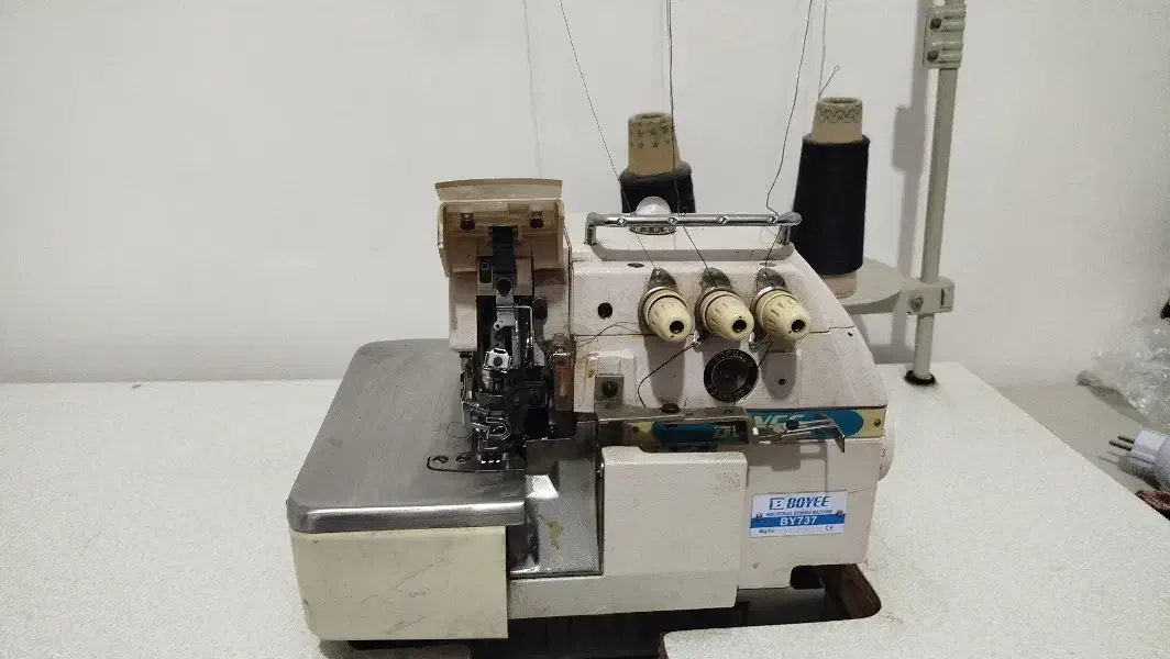 سردوز سه نخ|چرخ خیاطی و ریسندگی|دهلران, |دیوار