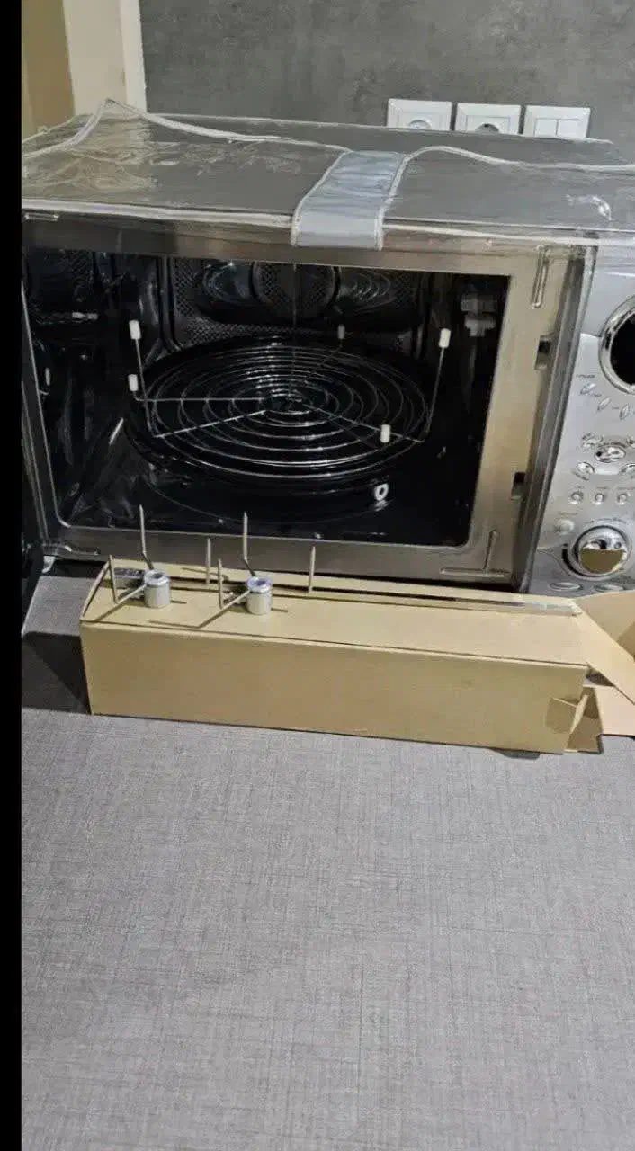 ماکروفر دوو اصل کره. پلوپز۶۰کاره دسینی|اجاق گاز و لوازم برقی پخت‌وپز|طرقبه, |دیوار