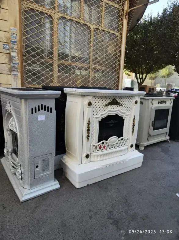 بخاری ( مدل طاووس طلایی ) رویه فلزی سیاه|بخاری، هیتر، شومینه|تبریز, |دیوار