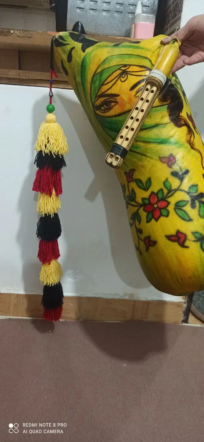 گمپل نی انبان|سازهای بادی|رشت, حومه رشت|دیوار