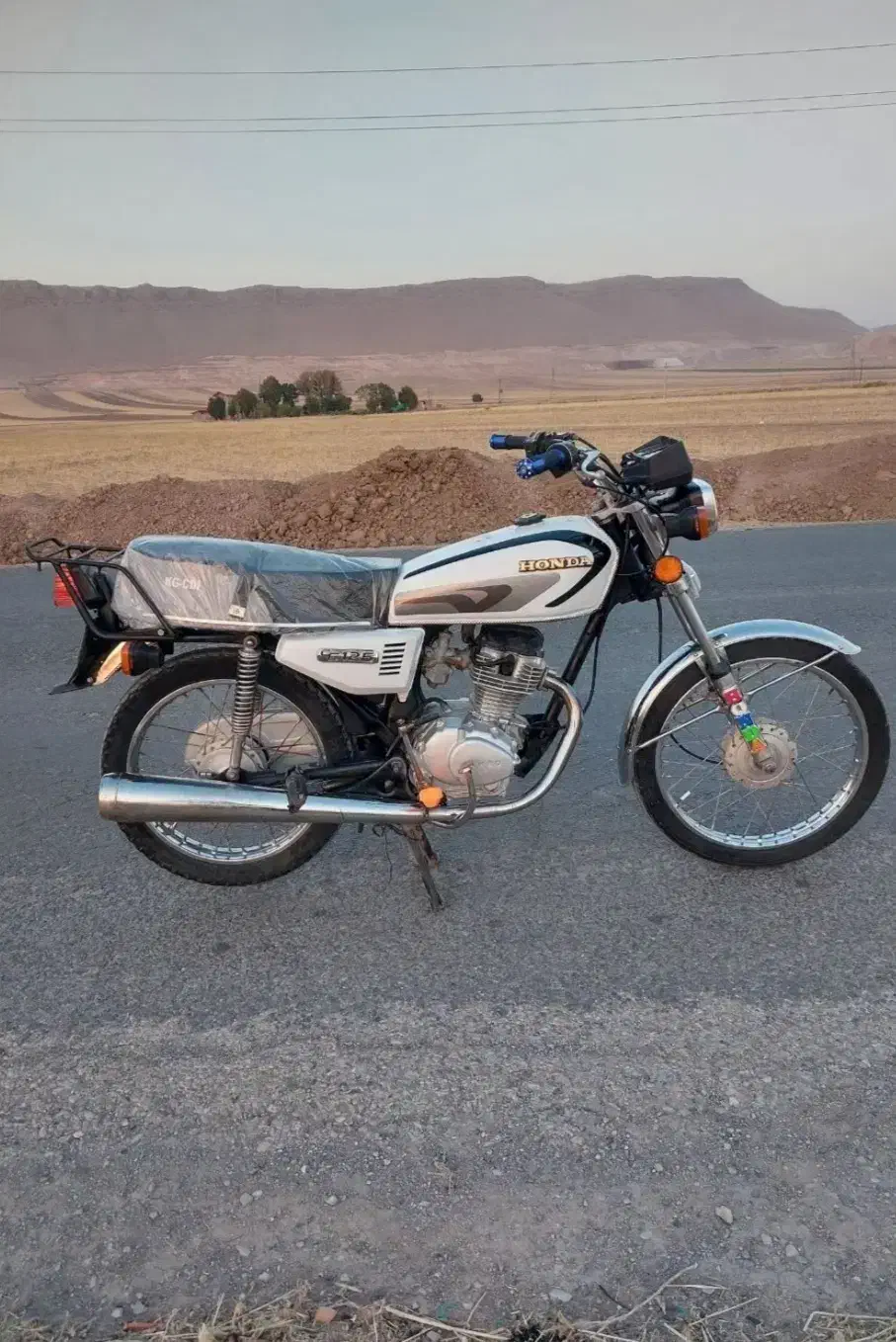 موتور 125|موتورسیکلت|گهواره, |دیوار