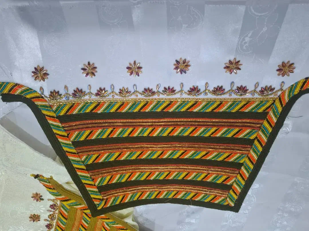 ودو گرهی|لباس|میناب, |دیوار