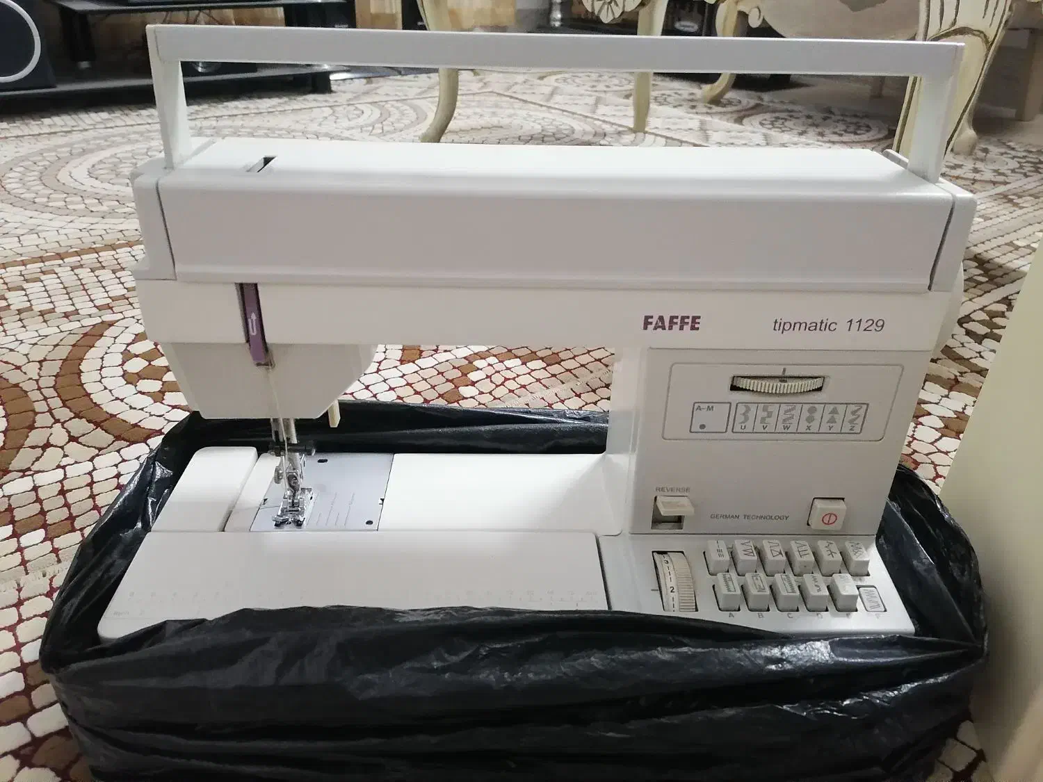 چرخ خیاطی|چرخ خیاطی و ریسندگی|گلبهار, شهر جدید گلبهار|دیوار