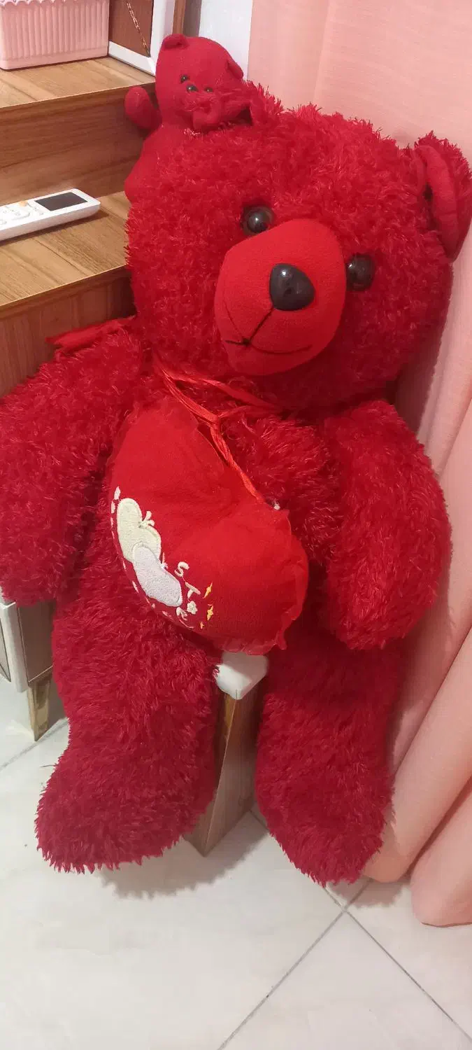 عروسک قرمز|اسباب‌بازی بچه|بندرعباس, |دیوار