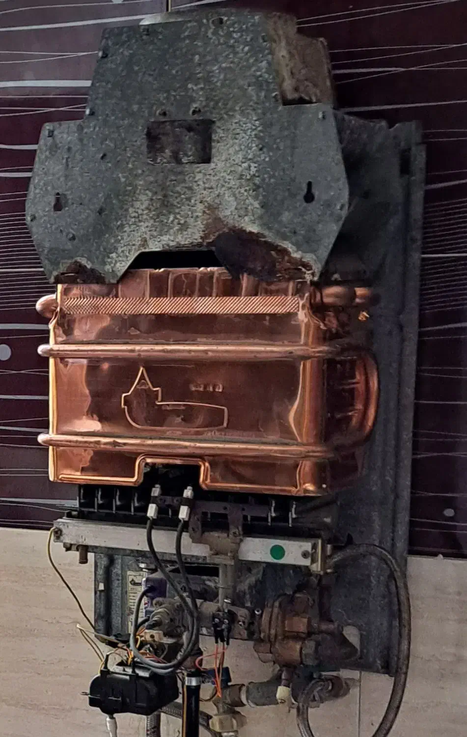 تعمیر تخصصی فقط آبگرمکن شومینه بخاری|خدمات پیشه و مهارت|گرگان, |دیوار