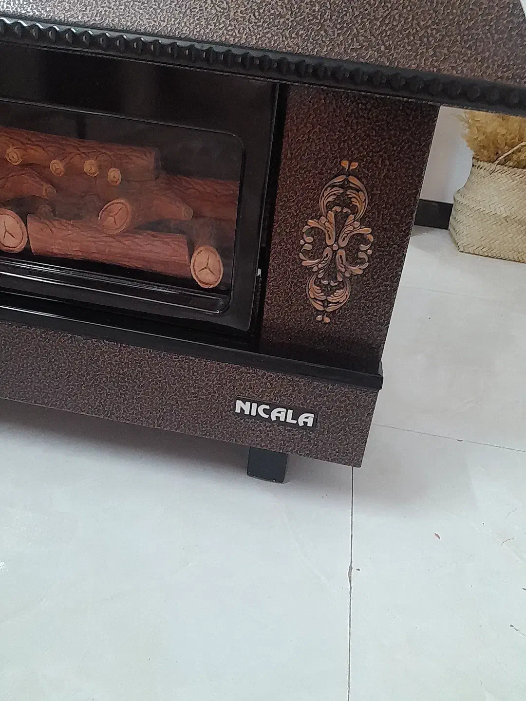 بخاری شومینه نیک کالا۲۸۰۰۰|بخاری، هیتر، شومینه|شیروان (خراسان), |دیوار