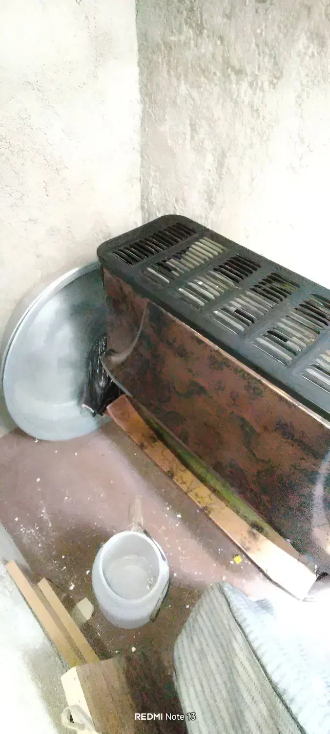 بخاری طرح شومینه۱۲هزار درحد نو|بخاری، هیتر، شومینه|زرندیه, |دیوار