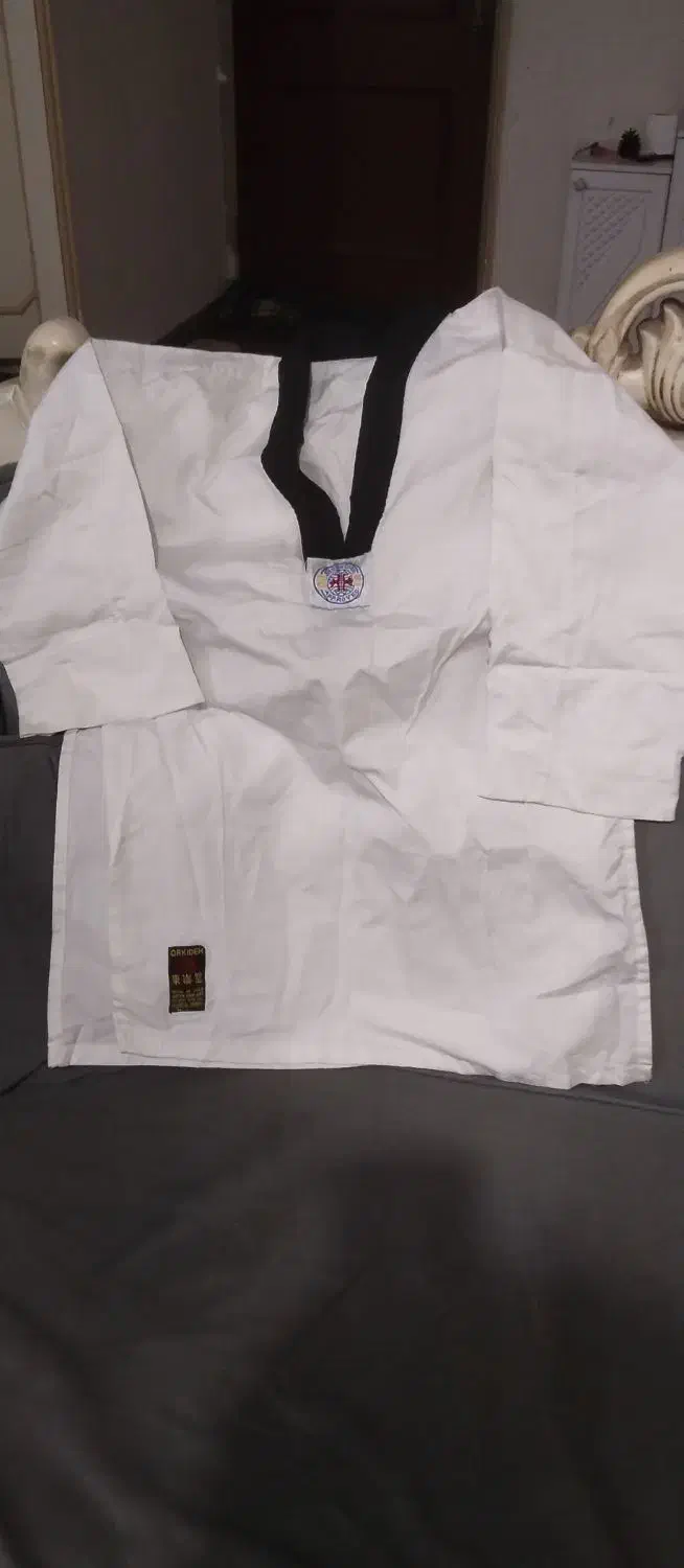 لباس تکواندو.|تجهیزات ورزشی|ری, شهادت|دیوار