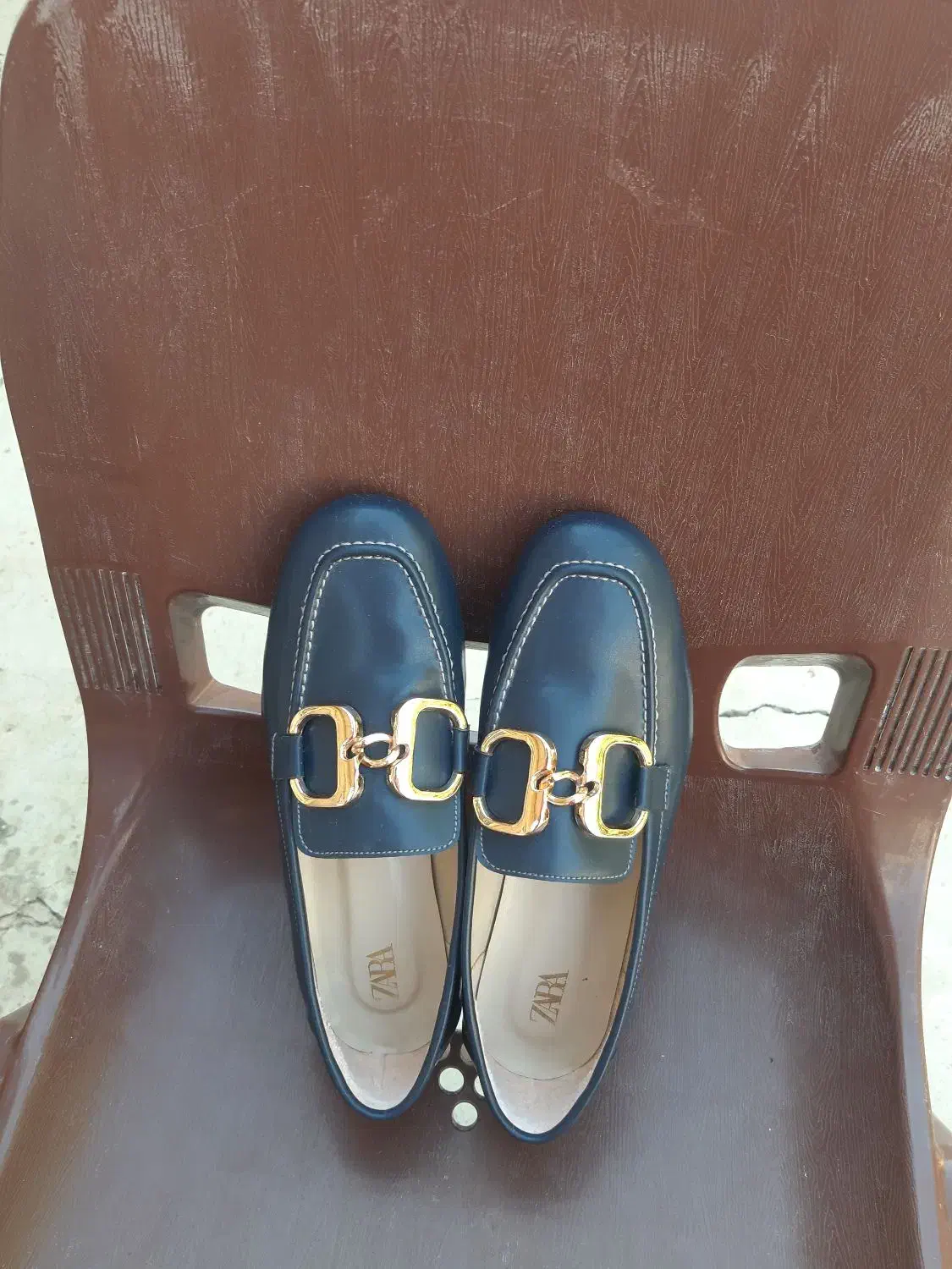 یک جفت کفش|کیف، کفش، کمربند|مسجد سلیمان, |دیوار