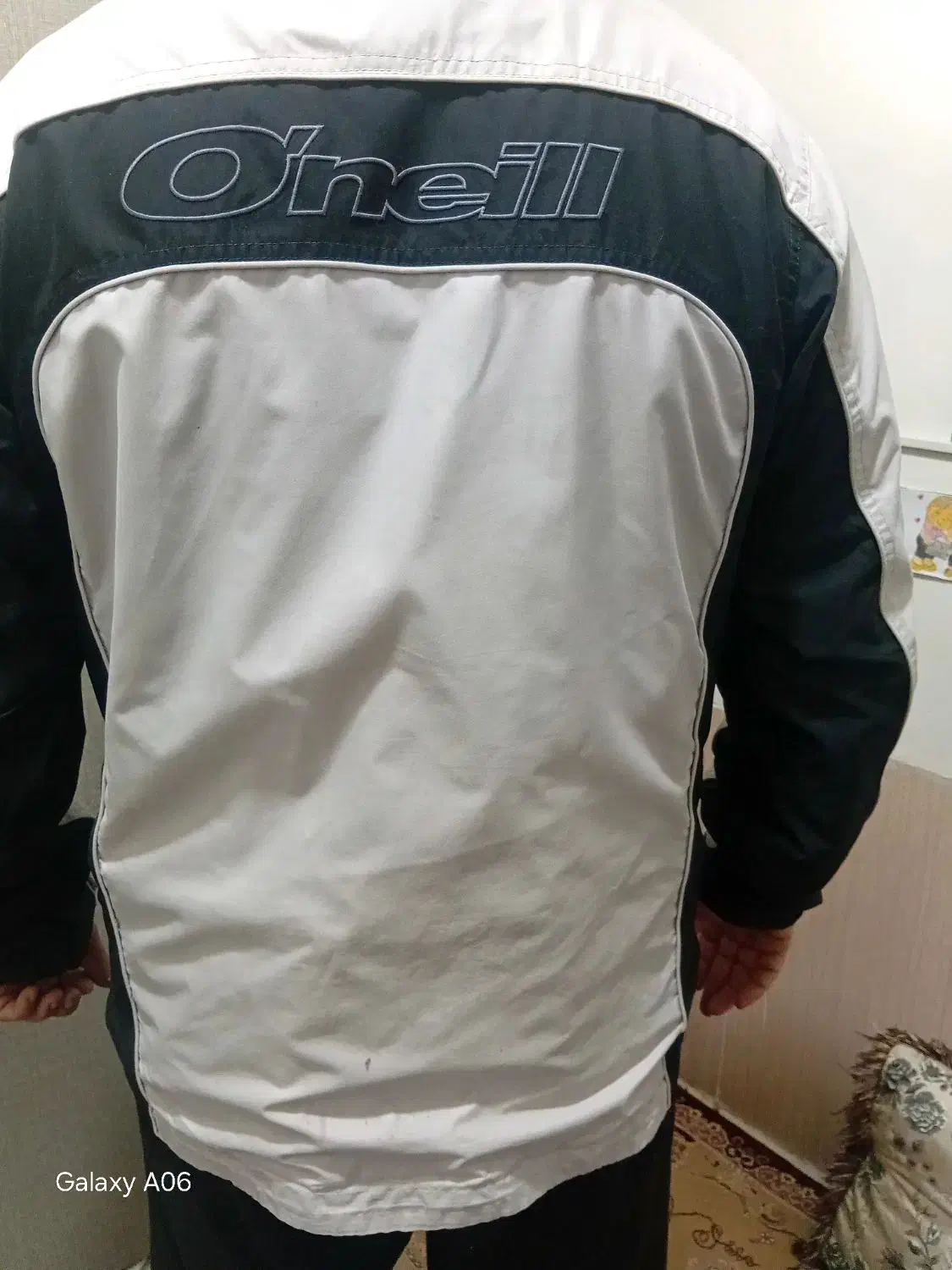 کاپشن|لباس|بروجرد, |دیوار