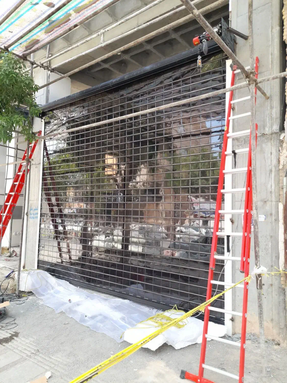 نصب و تعمیر کرکره برقی شیشه سکوریت جک|خدمات پیشه و مهارت|سنندج, |دیوار