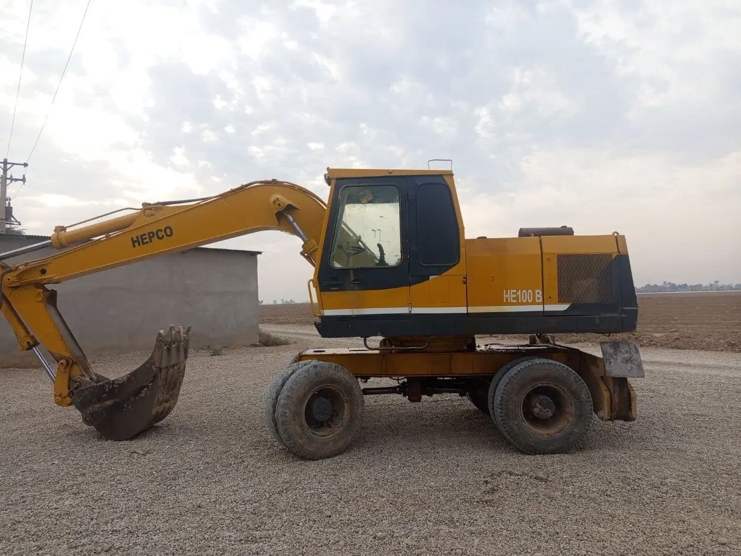 بیل میکانیکی چرخ لاستیکی اچ ای 100|خودرو سنگین|کرخه, |دیوار