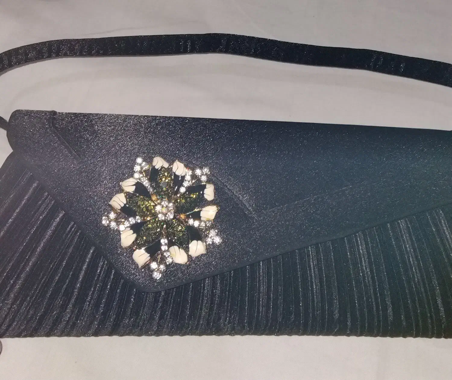 کیف مجلسی|کیف، کفش، کمربند|رشت, چله خانه|دیوار