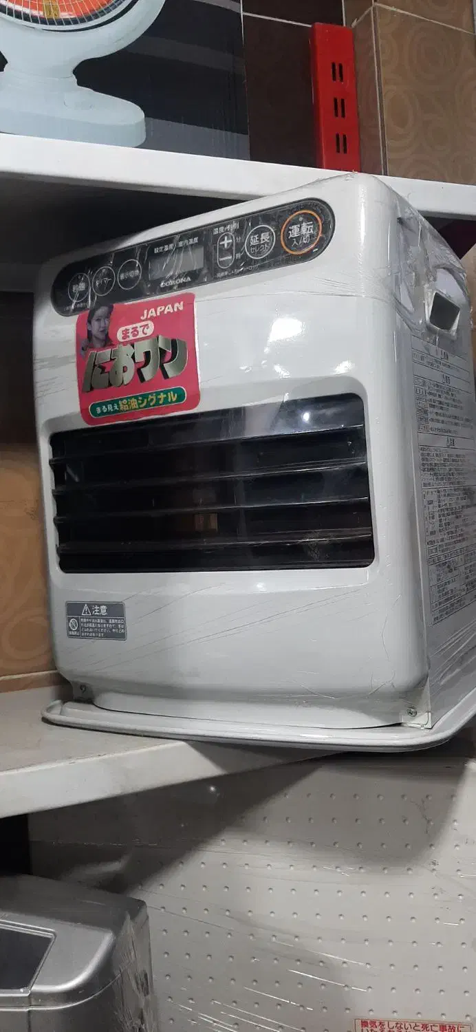 بخاری نفتی برقی ژاپنی ۵۶۰۰ کالری|بخاری، هیتر، شومینه|بانه, |دیوار