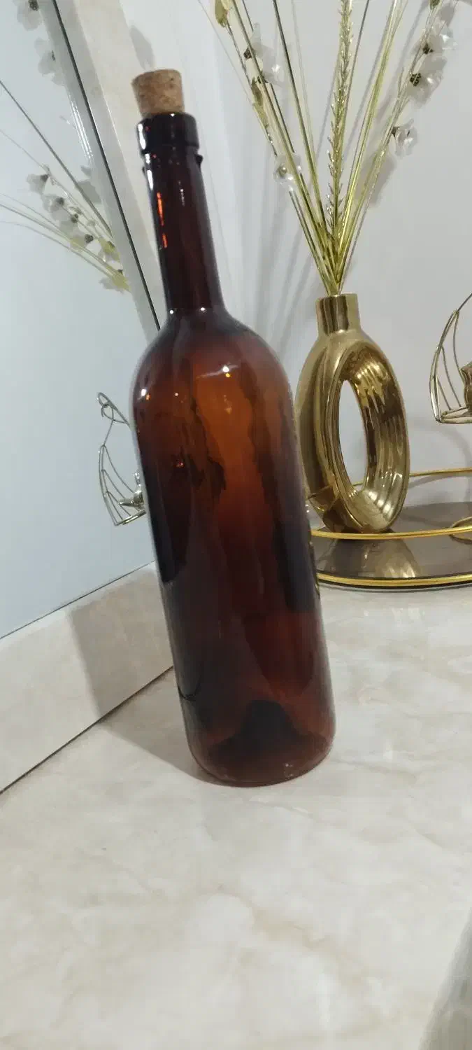 بطری شیشه ای یک لیتری در چوبی(پنبه دار)|ظروف نگهدارنده، پلاستیکی، یکبارمصرف|اهواز, سیصد دستگاه|دیوار