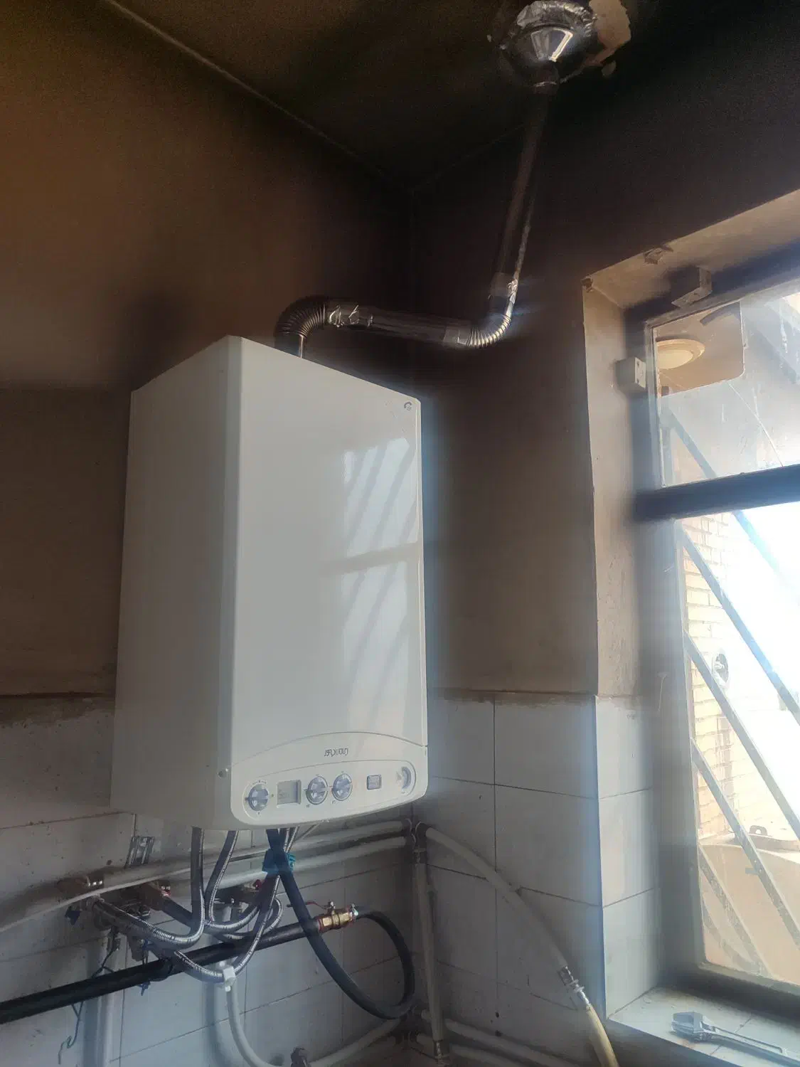 نصب و تعمیر انواع پکیج کولر گازی رادیاتور وابگرمکن|خدمات پیشه و مهارت|ایلام, |دیوار