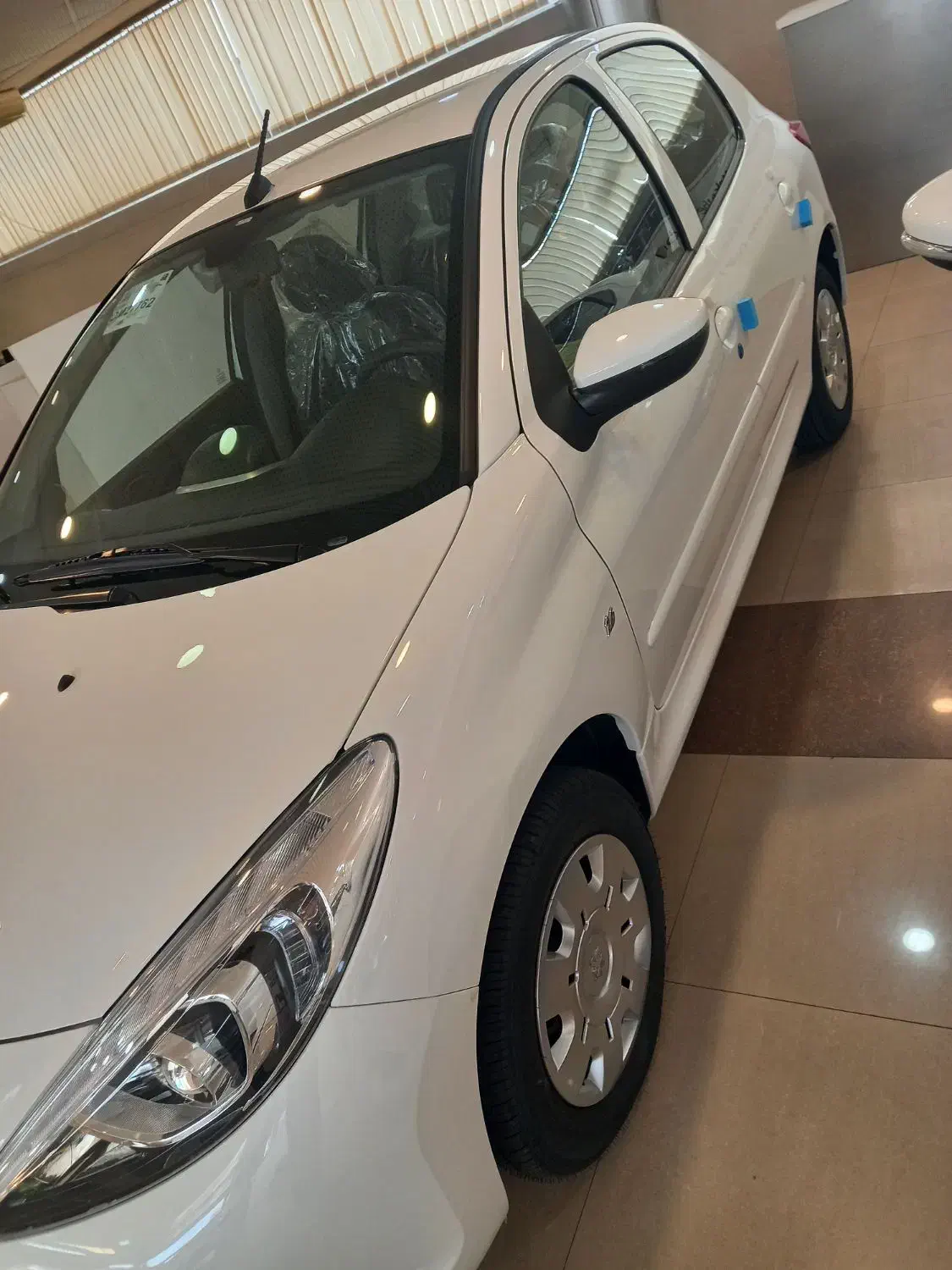 ۲۰۷ تیوفایو  ارتقاع یافته صفر خشک|خودرو سواری و وانت|رشت, هلال احمر|دیوار