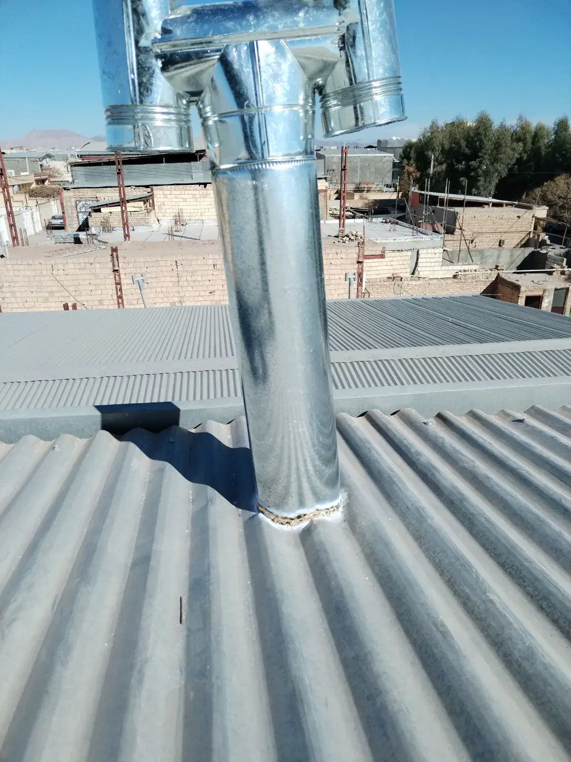 نصب وکاربیت لوله بخاری وشومینه سقف شیروانی|خدمات پیشه و مهارت|سیرجان, |دیوار