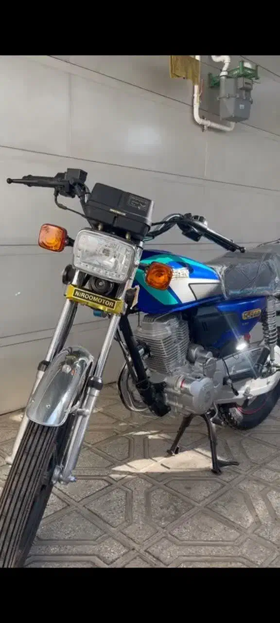 احسان ۲۰۰ خشک|موتورسیکلت|بردسکن, |دیوار