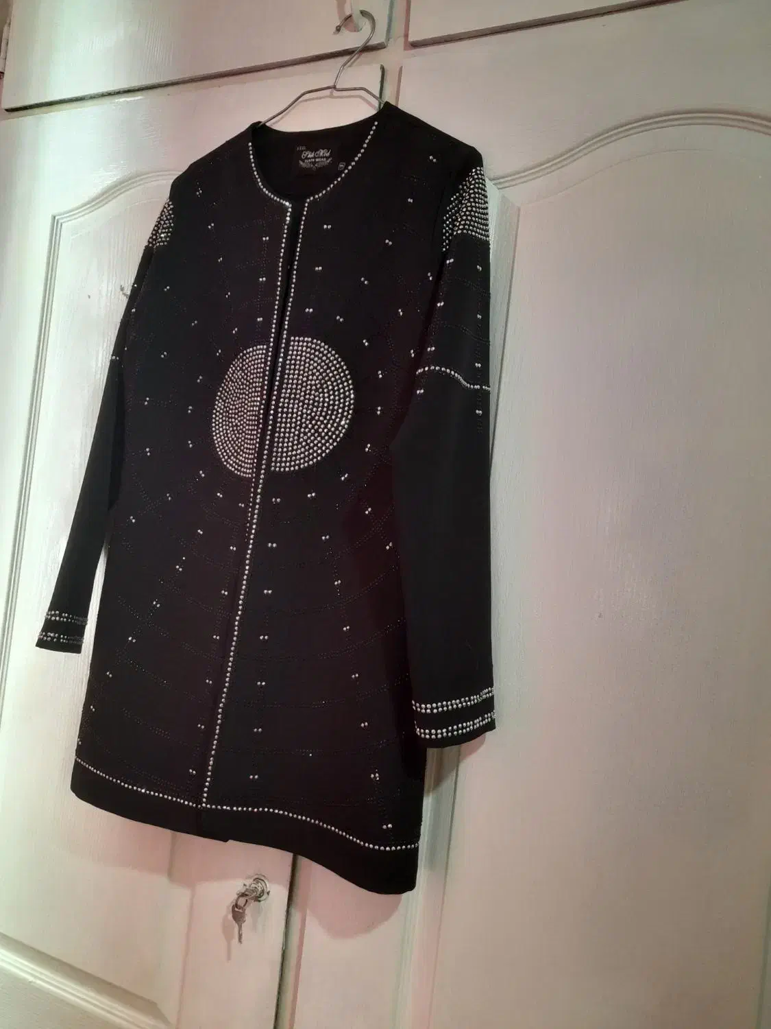 مانتو|لباس|آفتاب, |دیوار