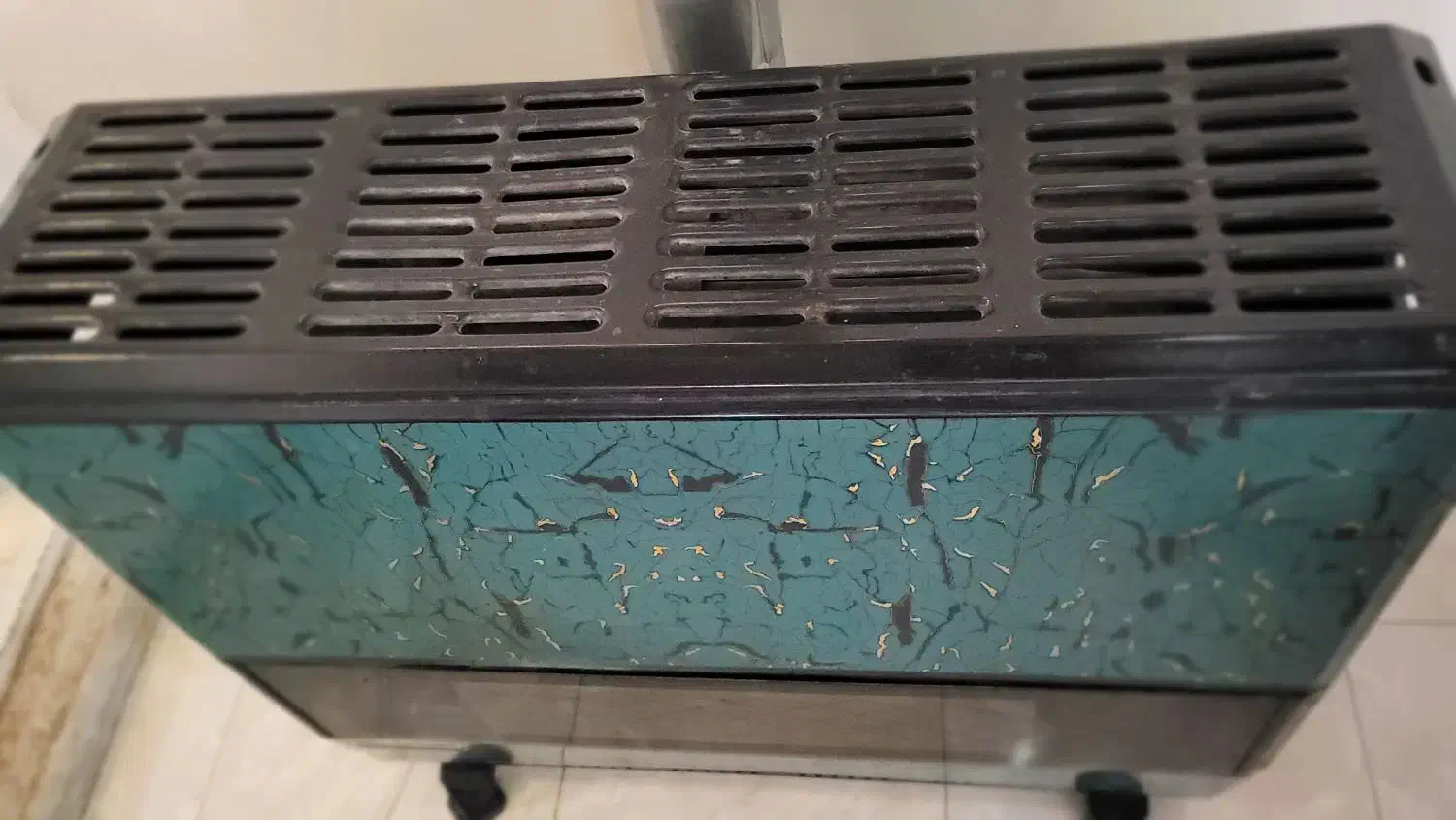 بخاری ایران شرق|بخاری، هیتر، شومینه|رشت, حمیدیان|دیوار