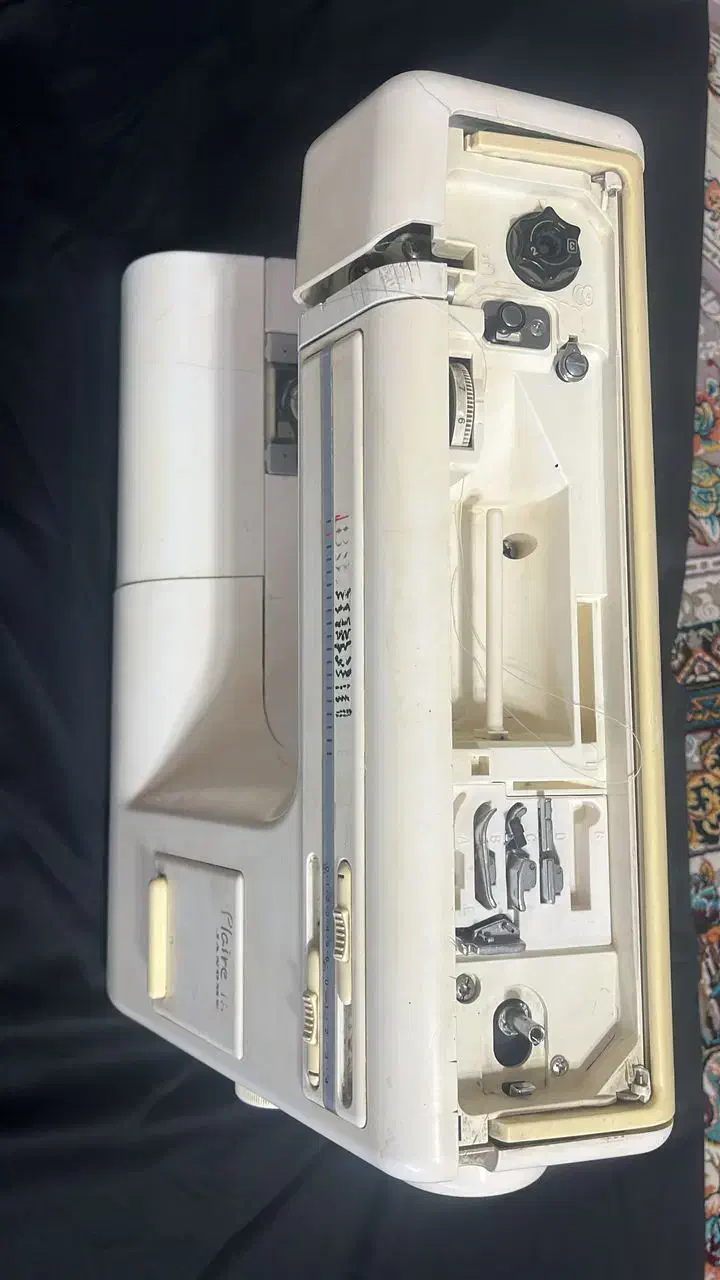 چرخ خیاطی ژانومه|چرخ خیاطی و ریسندگی|قدس, شهر‌قدس|دیوار