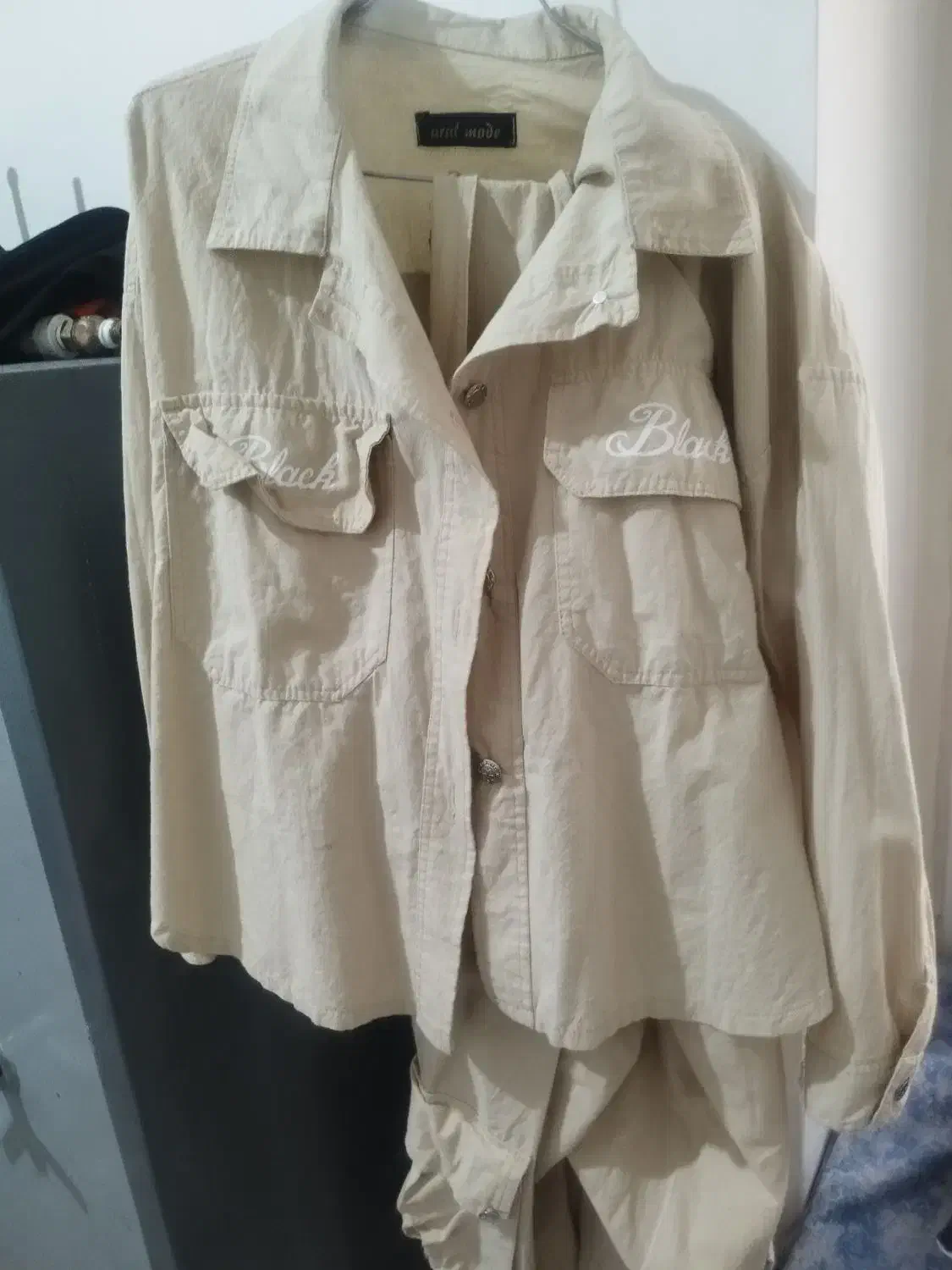 به علت سایز نبودن|لباس|خمین, |دیوار